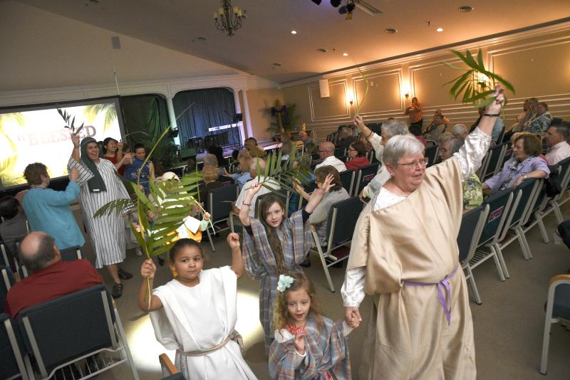 Youngsters flow through the congregation announcing that Jesus is coming. Marissa Hurley, Liana Evins, Cheryl Tippie and in back is Phoenix Mullin.